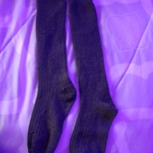 Charcoal grey tall socks.